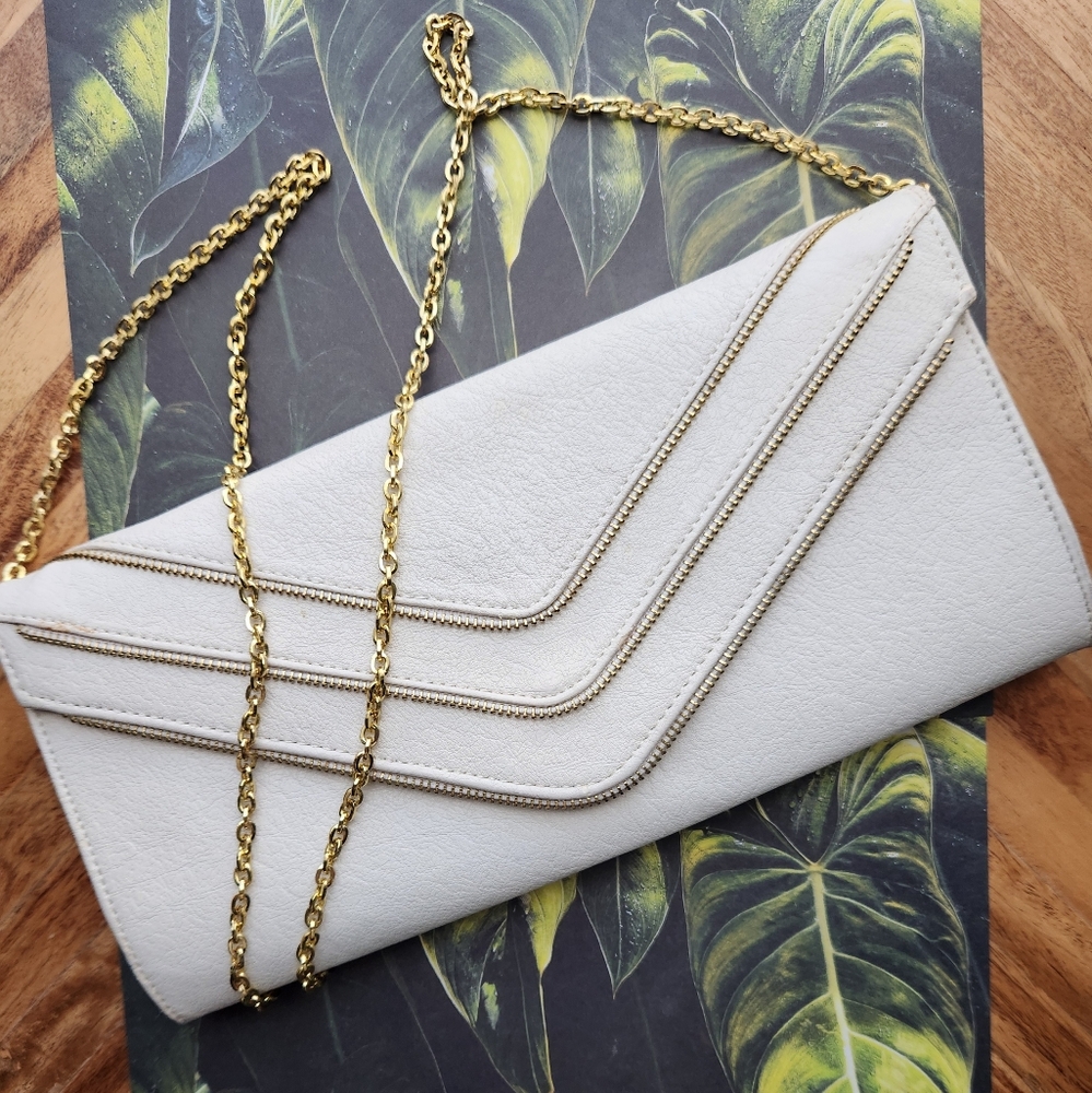 Elegant White Clutch with Gold Chain